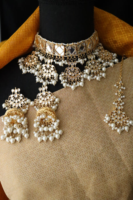 Heera white Kundan stone and pearls necklace with earrings and tikka 176344