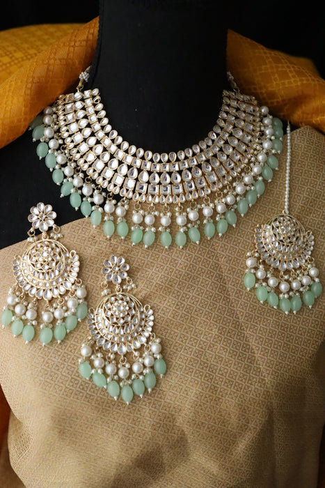 Heera white Kundan stone and mint pearls necklace with earrings and tikka 1763322