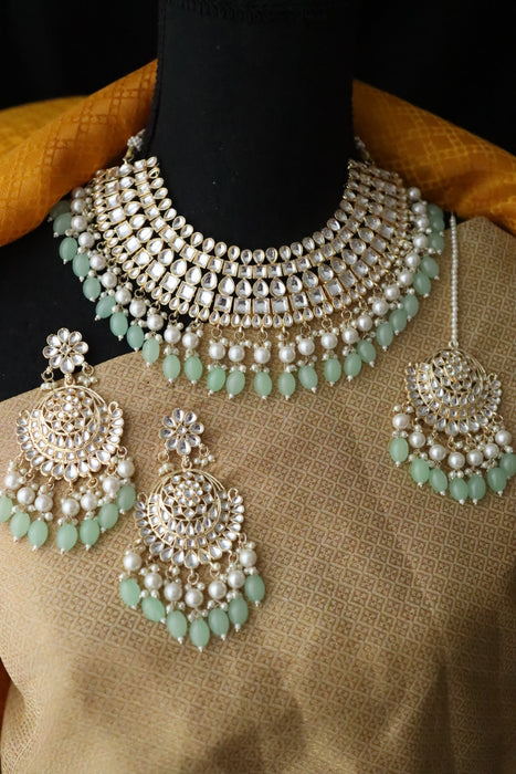 Heera white Kundan stone and mint pearls necklace with earrings and tikka 1763322