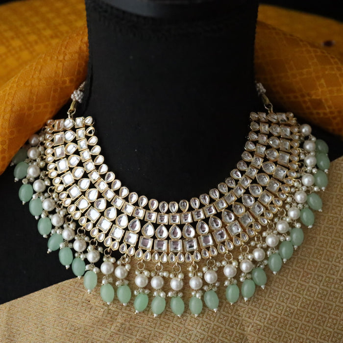 Heera white Kundan stone and mint pearls necklace with earrings and tikka 1763322