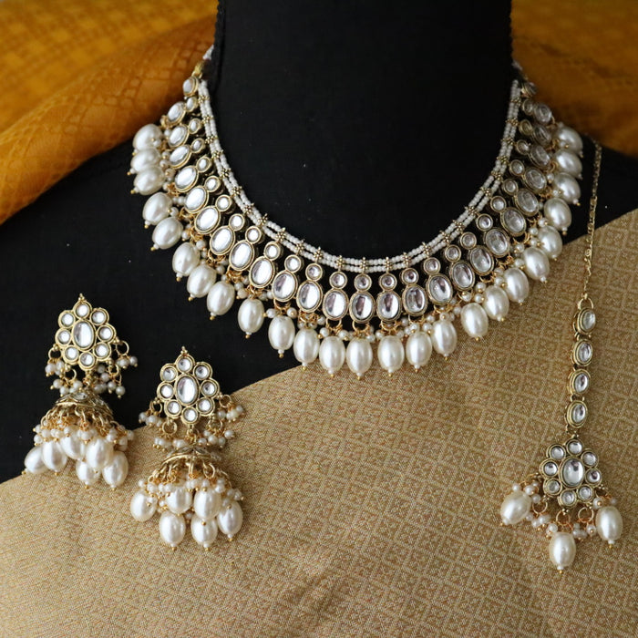 Heera white Kundan stone and pearls necklace with earrings and tikka 17632213