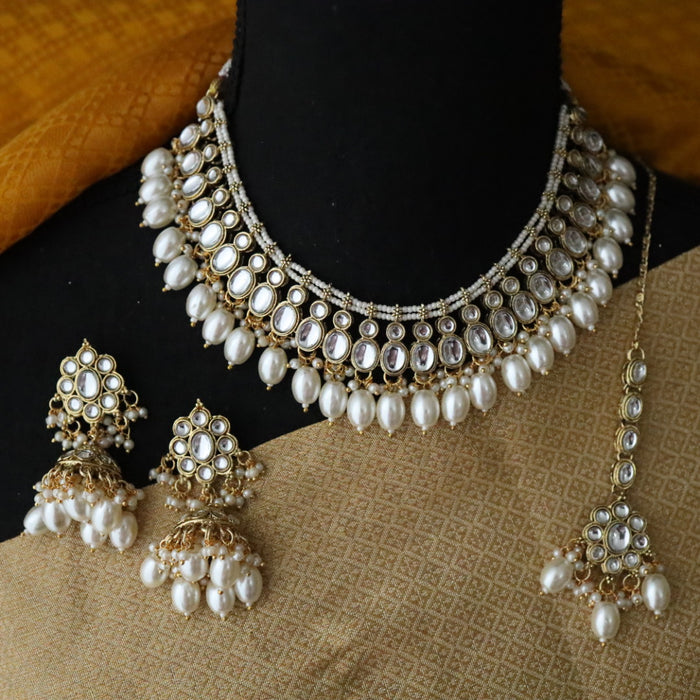 Heera white Kundan stone and pearls necklace with earrings and tikka 17632213