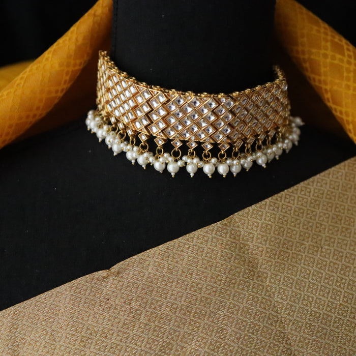 Heera white Kundan stone and pearls choker with earrings and tikka 17632214