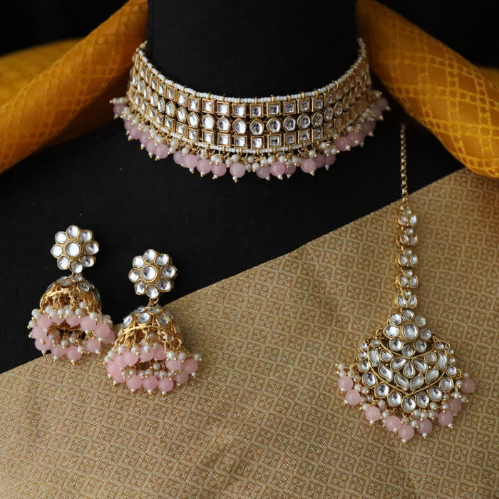 Heera white Kundan stone and pink pearls necklace with earrings and tikka 176311