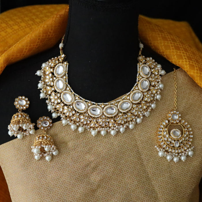 Heera white Kundan stone and pink pearls necklace with earrings and tikka 176312