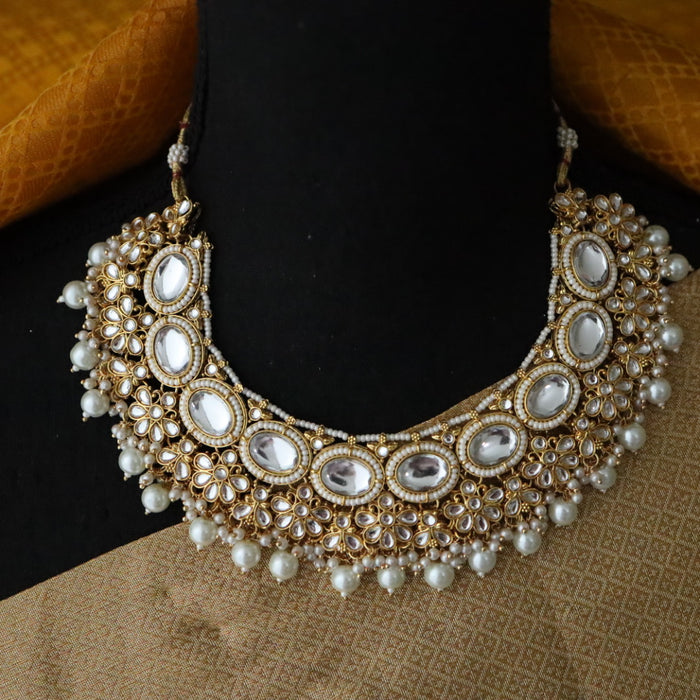 Heera white Kundan stone and pink pearls necklace with earrings and tikka 176312