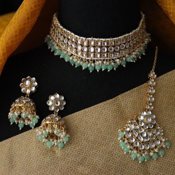 Heera white Kundan stone and pink pearls necklace with earrings and tikka 1763123
