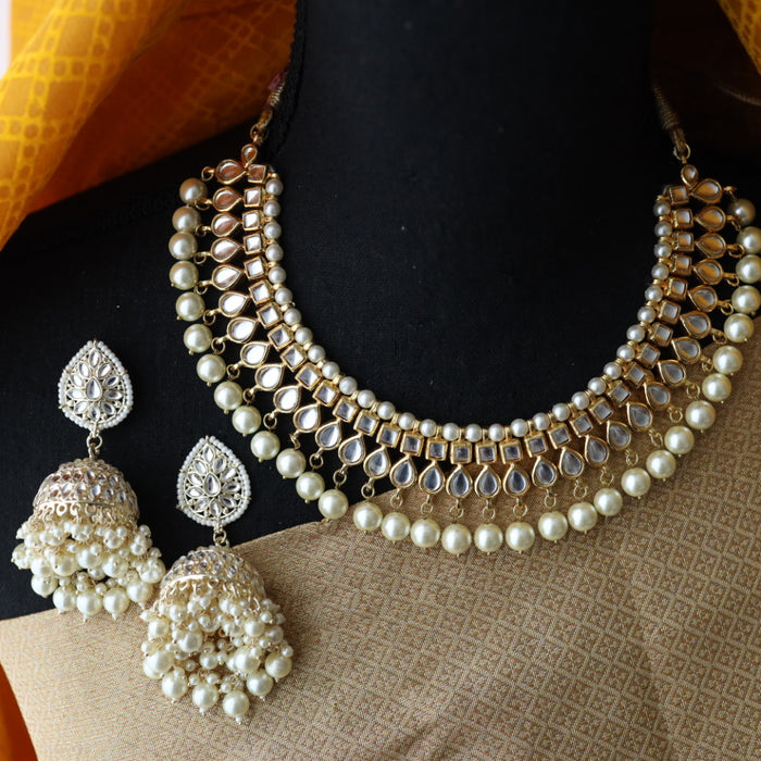 Heera white Kundan stone and pearls choker with earrings and tikka 1763335