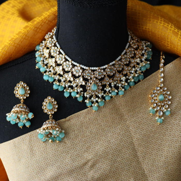 Heera white Kundan stone and mint pearls choker with earrings and tikka 1763340