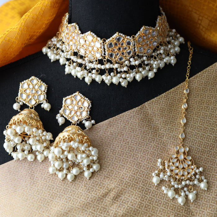 Heera white Kundan stone and pearls choker with earrings and tikka 176331