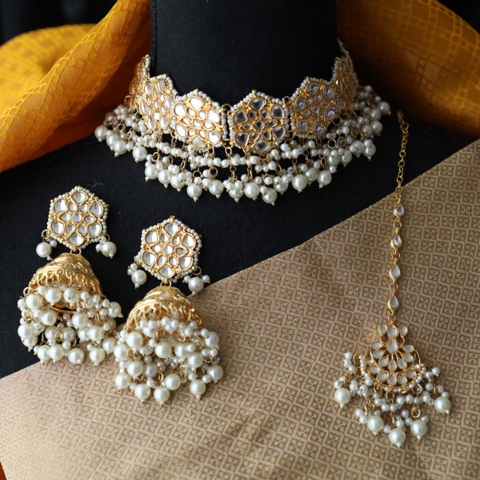 Heera white Kundan stone and pearls choker with earrings and tikka 176331