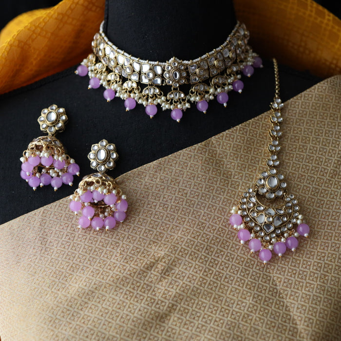 Heera white Kundan stone and purple pearls choker with earrings and tikka 1763340