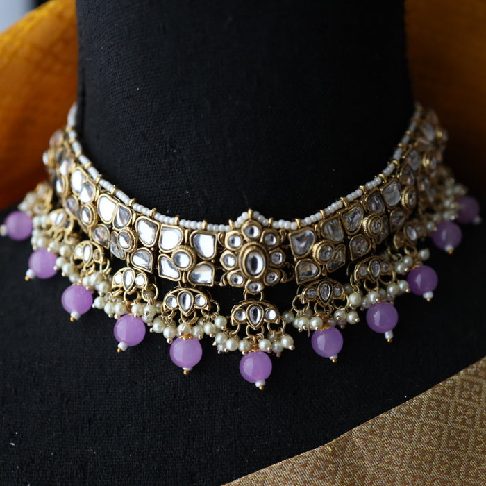 Heera white Kundan stone and purple pearls choker with earrings and tikka 1763340