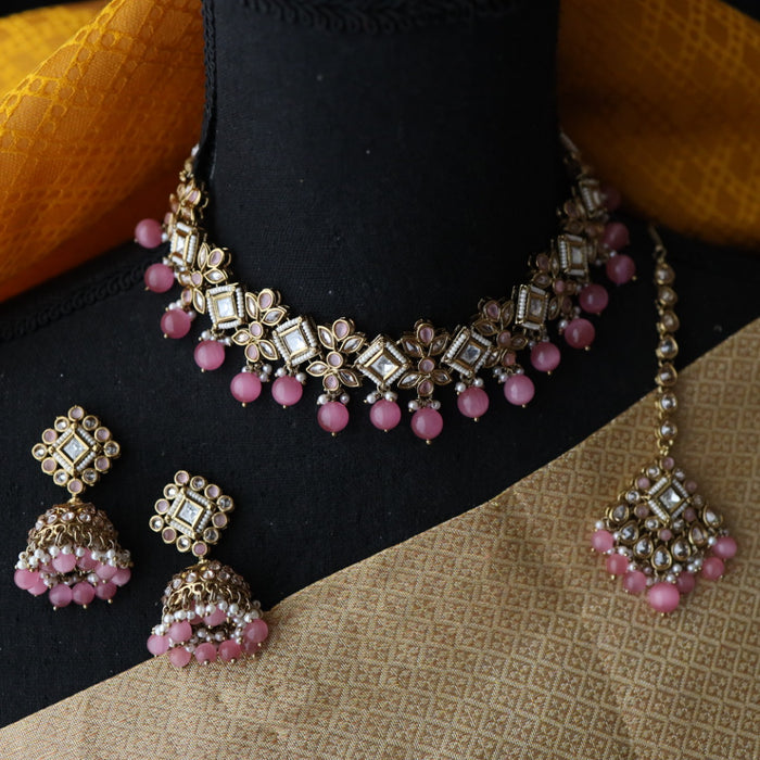 Trendy pink  pearls choker with earrings and tikka 1763378