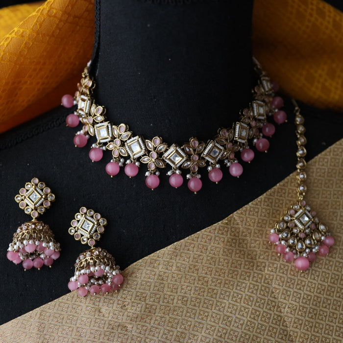 Trendy pink  pearls choker with earrings and tikka 1763378