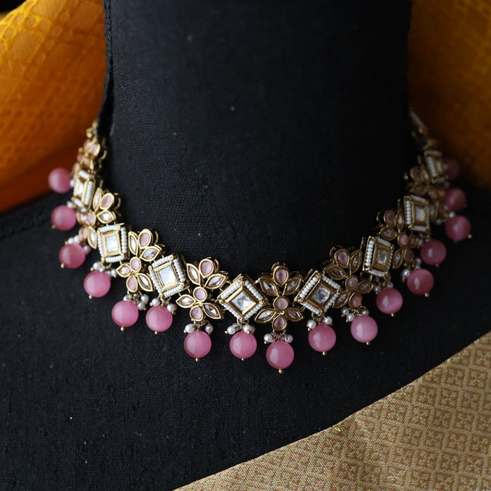 Trendy pink  pearls choker with earrings and tikka 1763378