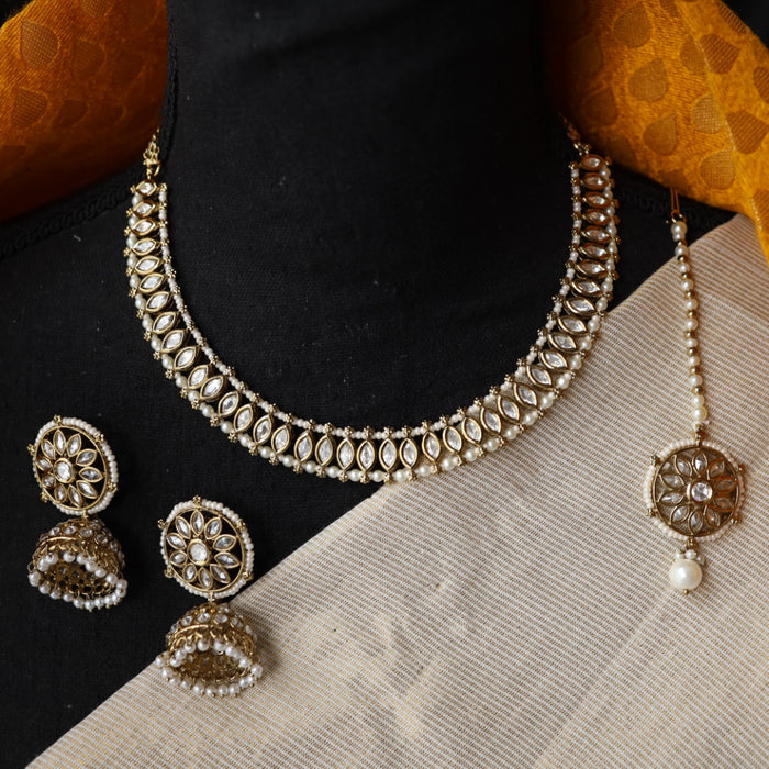 Trendy white stone short necklace with earrings and tikka