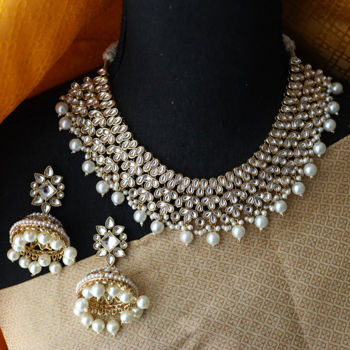 Heera white Kundan stone and pearls choker with earrings and tikka 234424