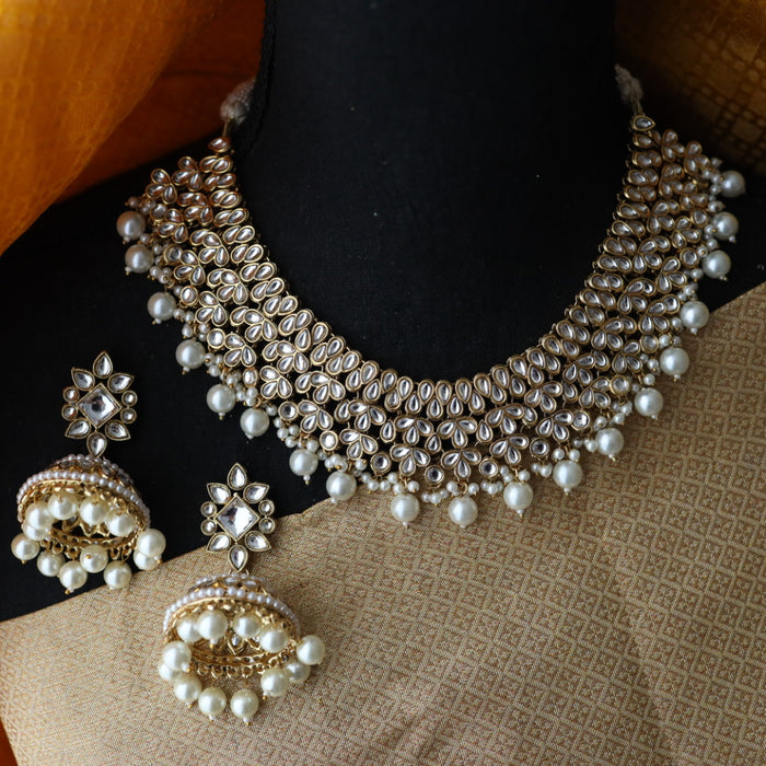 Heera white Kundan stone and pearls choker with earrings and tikka 234424