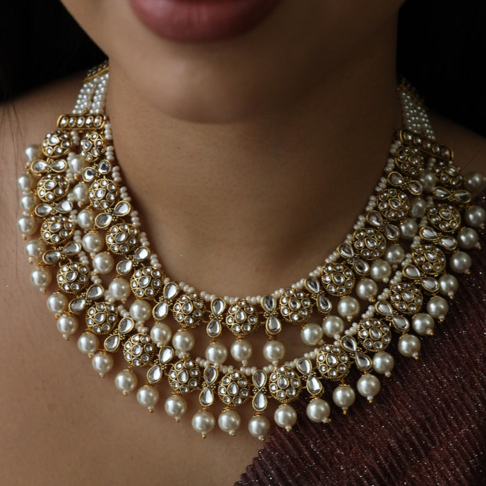 Trendy white beads short necklace with earrings and tikka 23492765