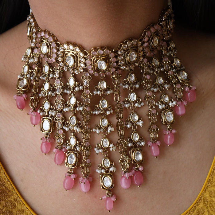 Trendy pink pearl bead choker necklace with earrings and tikka 1487633